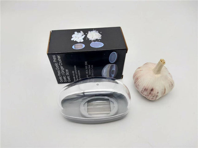 Kitchen Gadgets Plastic Small Garlic CutterProduct material: ABS+PS+304    Product size: 11*4.5*6.5cm