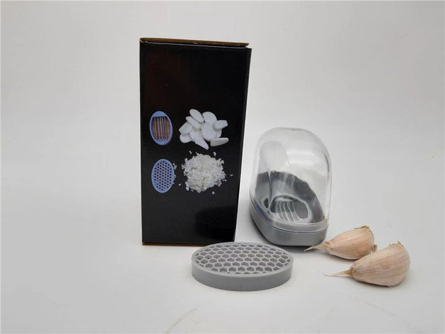 Kitchen Gadgets Plastic Small Garlic CutterProduct material: ABS+PS+304    Product size: 11*4.5*6.5cm