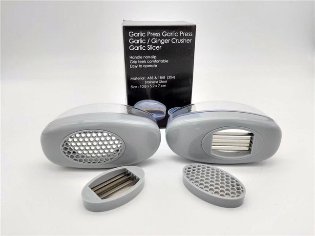 Kitchen Gadgets Plastic Small Garlic CutterProduct material: ABS+PS+304    Product size: 11*4.5*6.5cm