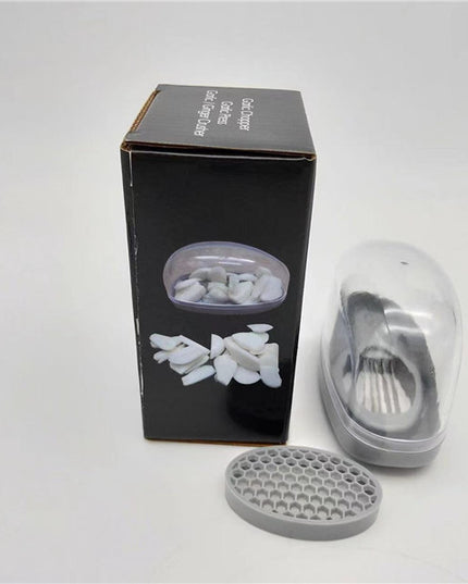 Kitchen Gadgets Plastic Small Garlic CutterProduct material: ABS+PS+304    Product size: 11*4.5*6.5cm